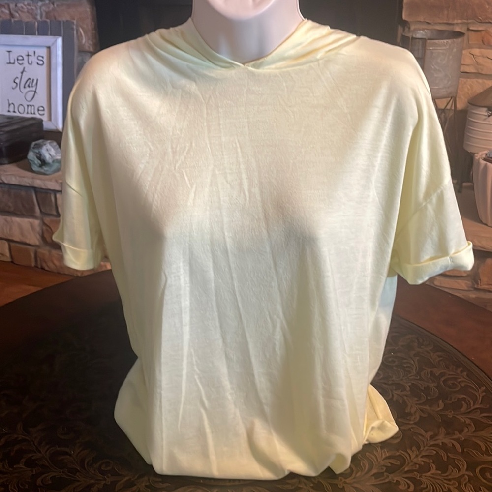 Yellow hooded athletic top
